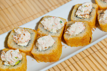 Close-Up of Tempura Shrimp Sushi with Chipotle Sauce