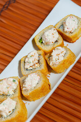 Close-Up of Tempura Shrimp Sushi with Chipotle Sauce