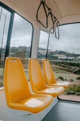 Fototapeta premium Interior view of a public transit vehicle with yellow seats