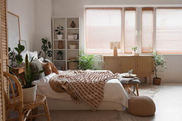 Interior of modern stylish light bedroom