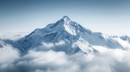 Obraz premium A majestic mountain peak covered in snow, standing tall above the clouds