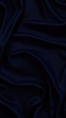 Obraz premium Black blue silk, satin. Shiny fabric surface. Beautiful wavy folds. Dark elegant background with space for design. Web banner.
