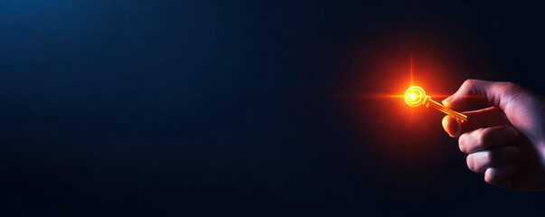 A hand holding a glowing firework igniting in darkness.