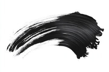 Black mascara stroke isolated on white background.  A smooth, flowing, dark black mascara swath against a clean white backdrop