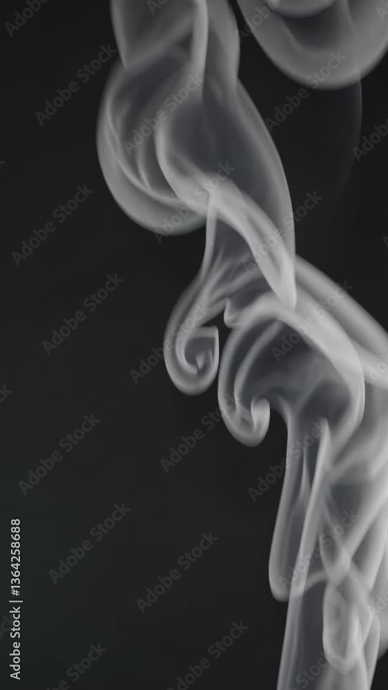 Poster close-up video of swirling smoke against a dark background, captured from a side angle, creating an 