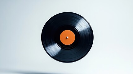 Obraz premium A vinyl record floats in the air against a white backdrop
