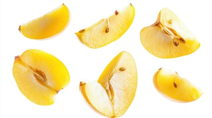 Several golden fruit slices arranged on a bright white background