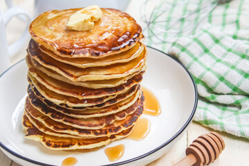 stack of pancakes with syrup