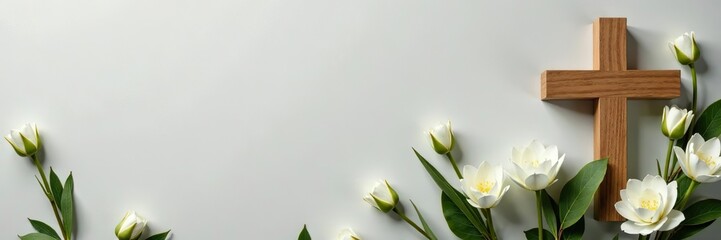 Christian wooden cross and white flowers arrangement on muted background for funeral template,  remembrance, Christian