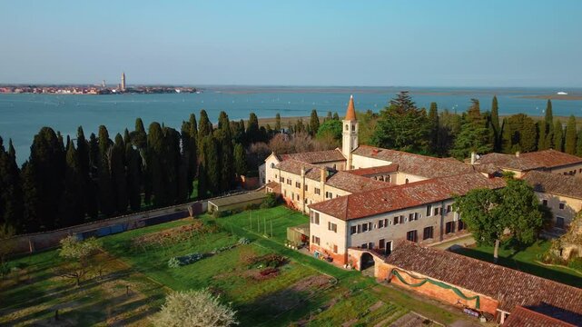 Monastery of San Francesco del deserto in Venice. Venice lagoon seen from above with drone. Island of San Francesco del deserto, Burano, Murano, Torcello.