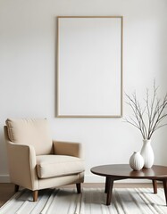 A blank poster on a white wall, a beige armchair, a dark brown coffee table, a vase with branches, and a white sculpture in a minimalist living room