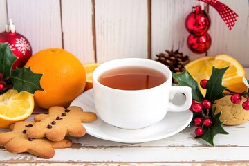 Tea with gingerbread cookies and oranges for Christmas