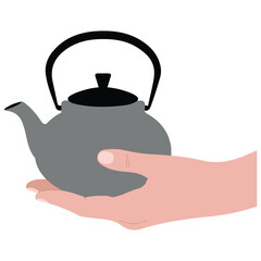 Hand holding kettle