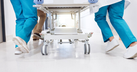 Running, hospital and doctors with gurney for emergency, surgery and help for medical service....