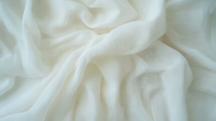 Obraz premium Elegant fabric texture with soft folds, evoking a sense of serenity and luxury
