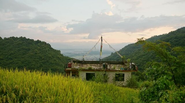 Pady Fields and Kathmandu City Sunset, Rural Landscape Scenery in Nepal with Rice Fields Paddies and Paddy Fields Terraces in a Rural Village in Kathmandu Valley with the City Behind