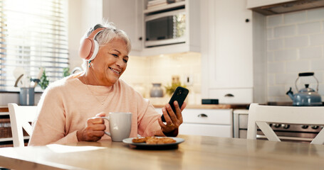Coffee, music or old woman in home with phone for streaming subscription, app or entertainment. Headphones, eating or happy senior person with food, smile or mobile for retirement, radio or podcast