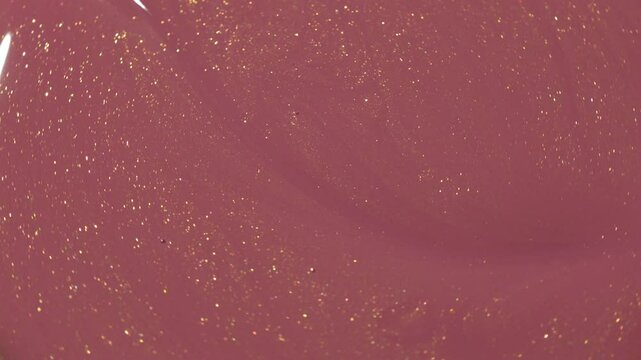 Smooth Brush Stroke on Gel Nail Polish. Close-Up Texture Video for Showing Structure of the Beauty Product.
