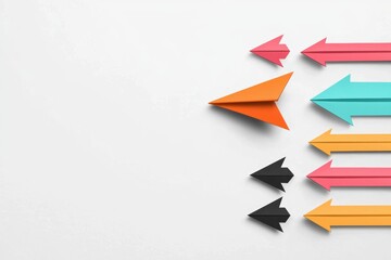 Colorful Paper Airplanes Pointing Different Directions on White Background for Leadership and Business Strategy Concept