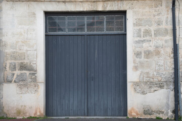 wooden old high door entrance barn grey garage ancient house gray building facade