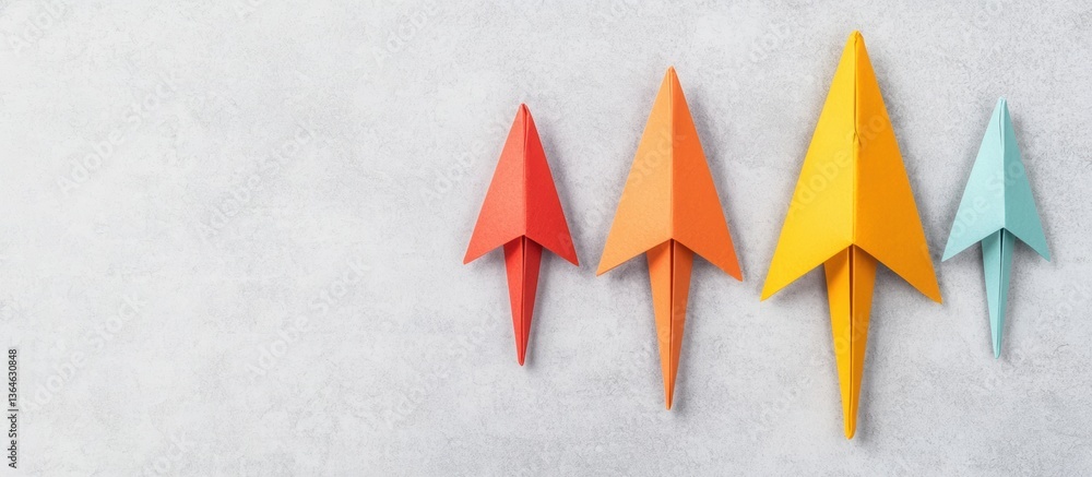 Poster four origami paper rockets pointing upward displaying colorful progress and ascent on a textured gra