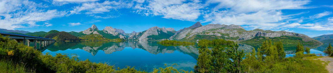 Fototapeta premium mMountain lake reflection in the reservoir of Riaño