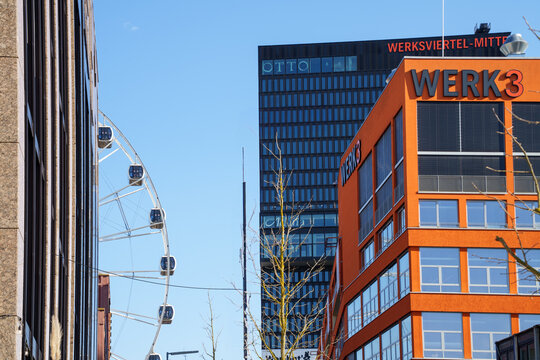 The Werksviertel-Mitte at Munich's Ostbahnhof (East Station). View of the Werk 3, the high-rise (Adina Hotel) and the Umadum Ferris wheel