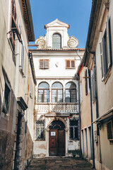 Koper, Slovenia - August 16, 2024: Picturesque street in the center of Koper with traditional architecture and Mediterranean charm