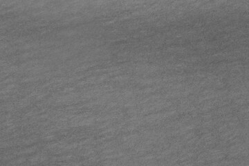 black and white backdrop: close up of thin paper texture