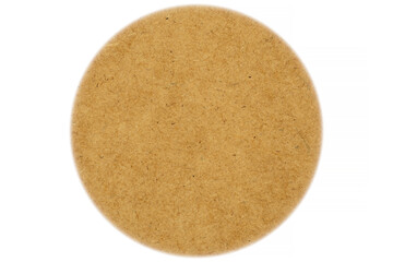 close up of round brown compressed board against white