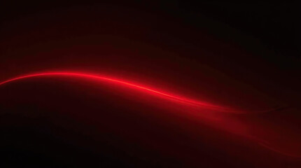Obraz premium A red line of light streaks across a dark space, symbolizing high-speed motion and digital technology, creating a sense of rapid movement and energy.
