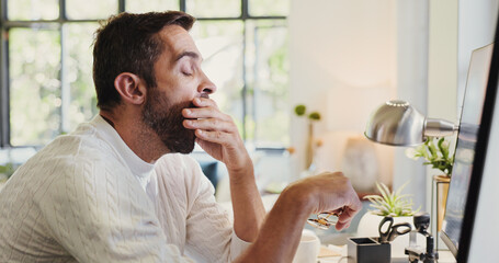 Yawn, computer and man in office with tired, burnout and low energy for deadline with project. Technology, fatigue and male freelance journalist working on article with bored, overworked and lazy.