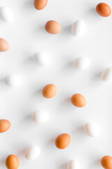 Background of chicken eggs, top view. Food pattern. Easter background