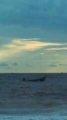 Fototapeta premium fishing boat and beautiful clouds