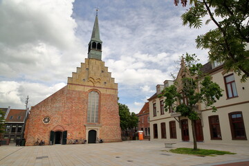 The Square Markt located in the historical center of Dokkum, Friesland, Netherlands, with Martinus Church (Grote Sint Martinuskerk)