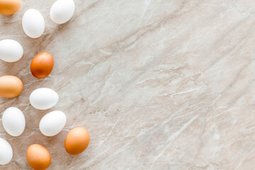 Chicken eggs on cooking table, top view. Food pattern. Easter background