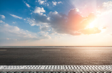 Empty asphalt road and beautiful sky clouds nature landscape at sunset