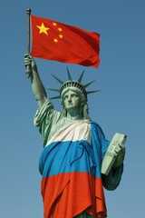 Statue of liberty holding chinese flag with russian colors drape