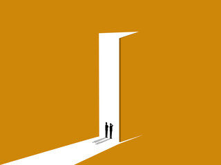 Two businessmen looking at the future of business together at the open door