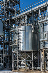 Metal structures, construction and manufacturing. Construction of an elevator, production facilities, and a factory. Production structures of the plant in the field of agricultural processing