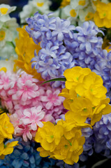 Colorful artificial flower arrangement with realistic details

