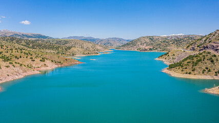Obraz premium Aerial view of Pusat Dam lake in green valley Halfeti Sivas Turkey