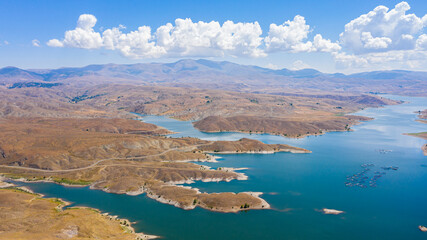 Aerial view of dam on a sunny and cloudy day Imranli, Sivas, Turkey
