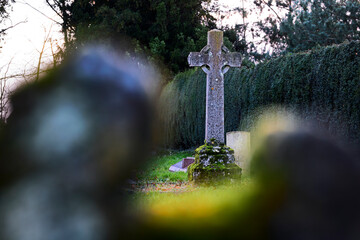 looking through at grave cross 