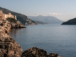 View of Dubrovnik Old Town walls and Lokrum island on the Adriatic Sea.