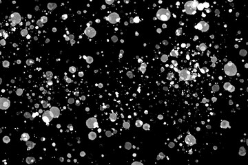 abstract ice and dust explosive in the air on black isolated