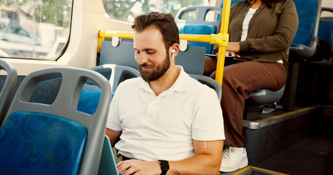 Bus, travel and businessman with earphones on laptop for journey, morning commute and trip in city. Public transport, passenger and person on computer listening to podcast, audio and radio in town - Powered by Adobe