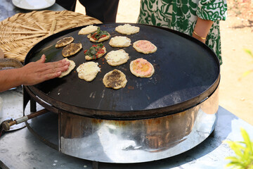 Woman Baking Manaqish on a Saj, Lebanon