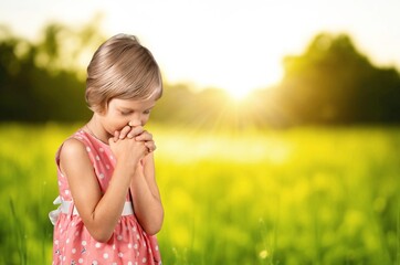 Young happy child pray, religion concept.