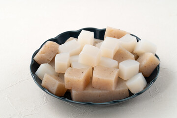 Raw konjac in square shape, also named konnyaku in Japan.